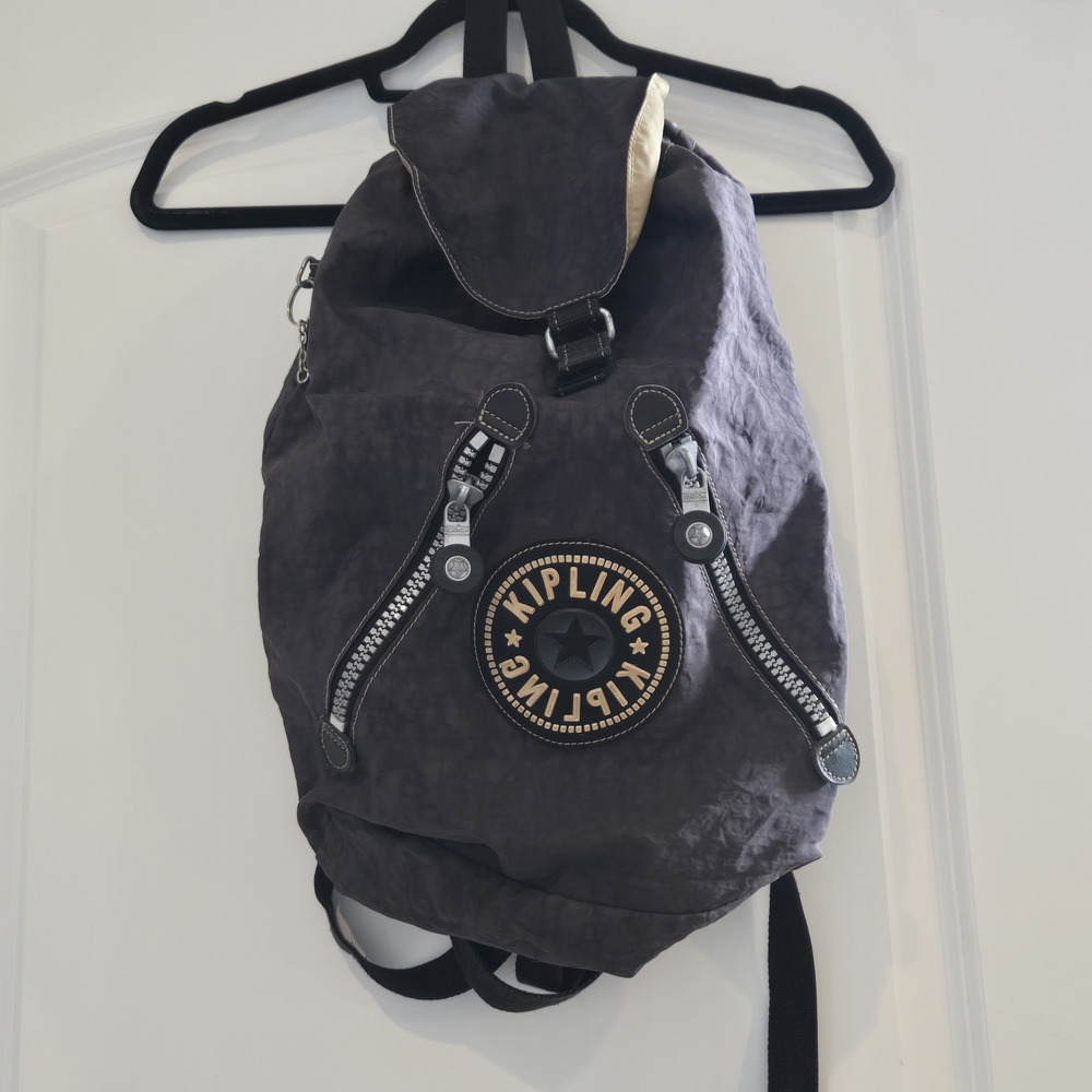 Kipling Charcoal Gray Backpack with Black Trim and Beige Accent